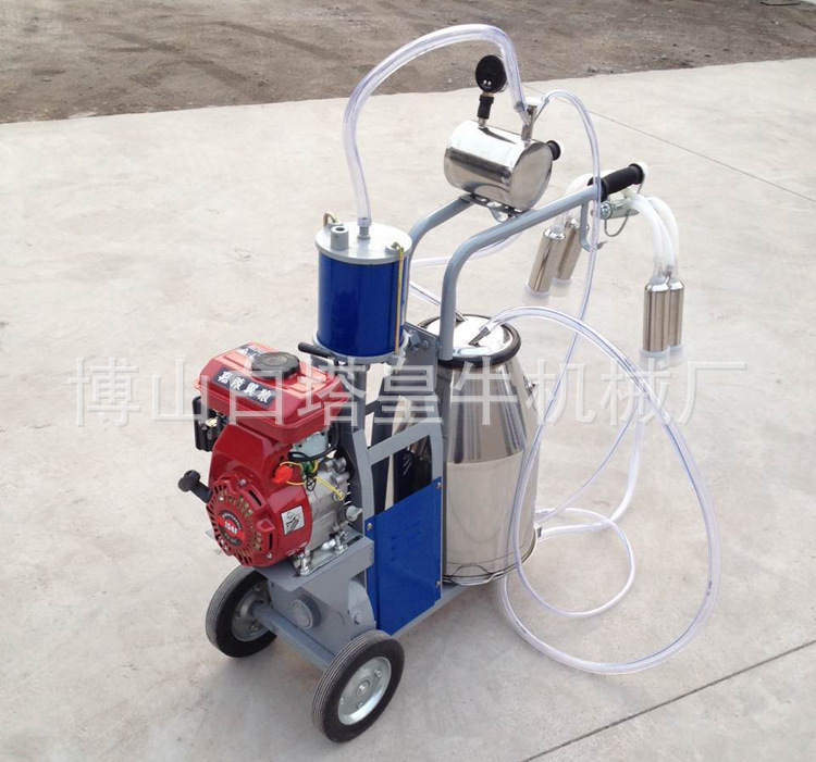 擠奶機